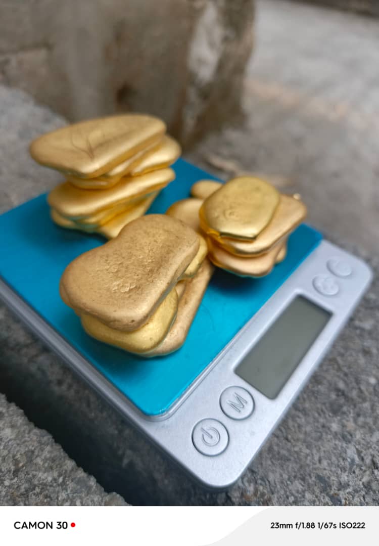 Gold on scale close-up